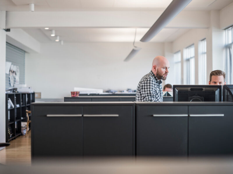 Employees in an open office.