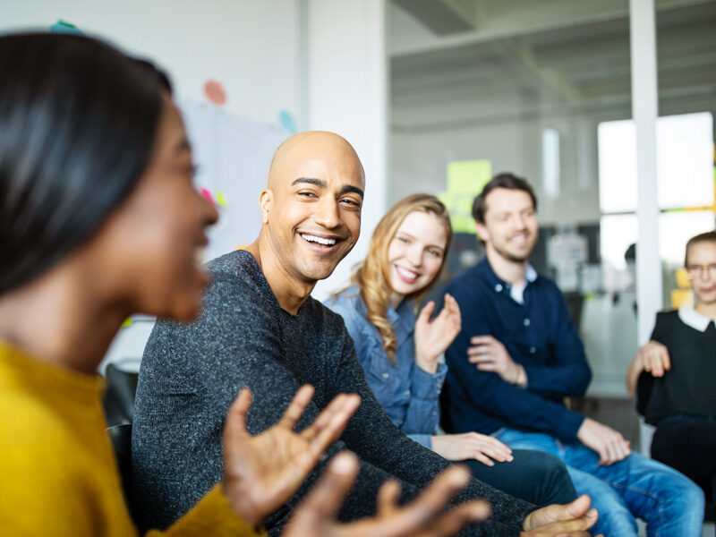 Group of employees having a great discussion